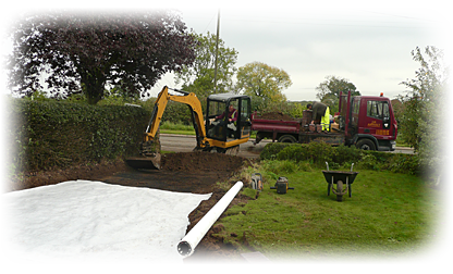 a photo of our workforce preparing a driveway for asphalting